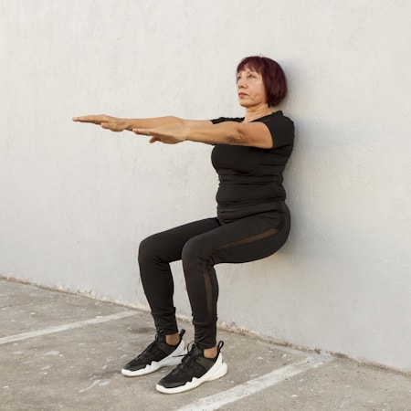 https://www.freepik.com/free-photo/long-view-woman-doing-wall-stand-exercise_8132651.htm#query=wall%20sit%20exercise&position=10&from_view=search&track=ais