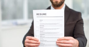 https://www.freepik.com/premium-photo/man-suit-holding-resume-job-hiring-close-up-view-focused-paper_17287191.htm#query=employment%20resume&position=17&from_view=search&track=ais