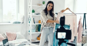 https://www.vecteezy.com/photo/13560744-beautiful-young-woman-in-casual-clothing-making-social-media-video-while-spending-time-at-home