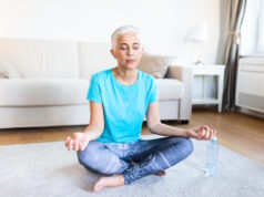 https://www.vecteezy.com/photo/20658292-senior-woman-practicing-yoga-sitting-in-half-lotus-exercise-ardha-padmasana-pose-working-out-wearing-sportswear-meditation-session-indoor-full-length-home-interior