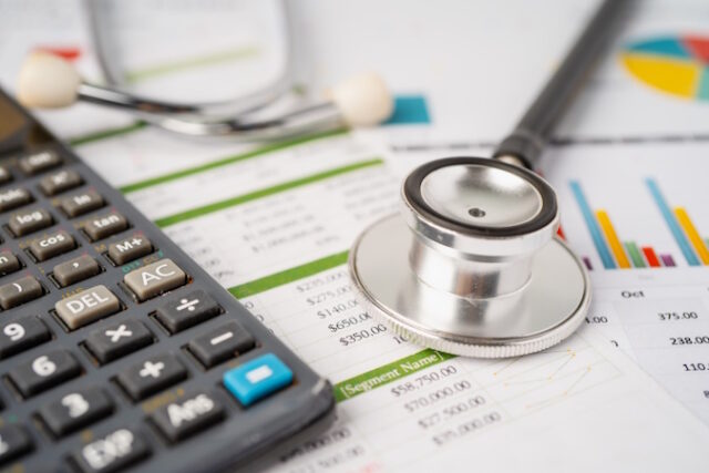 https://www.vecteezy.com/photo/2952493-stethoscope-on-calculator-finance-account-statistics-analytic-research-data-and-business-company-medical-health-concept