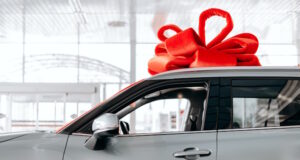 https://www.vecteezy.com/photo/3114933-the-new-car-is-wrapped-in-a-red-bow-beautiful-gift-concept