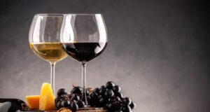 https://www.freepik.com/free-photo/front-view-wine-glasses-fresh-grapes-walnuts-yellow-cheese-wood-board-overturned-bottle-dark-background_17232192.htm#query=italian%20wines&position=18&from_view=search&track=ais