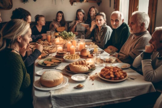 https://www.freepik.com/premium-ai-image/family-sits-table-with-table-full-food_44838917.htm#fromView=search&term=thanksgiving+dinner&page=1&position=29&track=ais_ai_generated&regularType=ai
