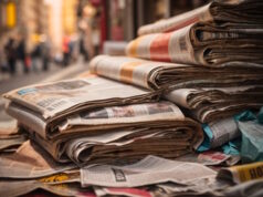 https://www.vecteezy.com/photo/29264920-pile-of-old-newspapers-selective-focus-ai-generated