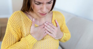 https://www.vecteezy.com/photo/23261508-young-woman-having-chestpain-acute-pain-possible-heart-attack-effect-of-stress-and-unhealthy-lifestyle-concept