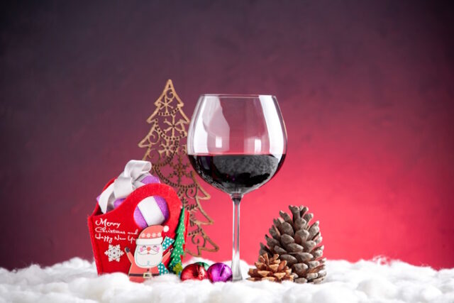 https://www.freepik.com/free-photo/front-view-xmas-gifts-toys-wine-glass-pinecone-red-background_17027924.htm#query=bottles%20holiday%20wines&position=46&from_view=search&track=ais&uuid=e7ec6f59-1de8-40a9-b9ca-2abab3b45b9c
