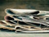 https://www.vecteezy.com/photo/24096273-newspapers-and-magazines-on-old-wood-background-toned-image