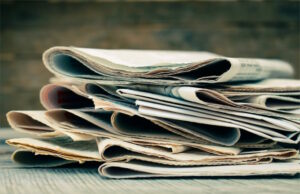 https://www.vecteezy.com/photo/24096273-newspapers-and-magazines-on-old-wood-background-toned-image
