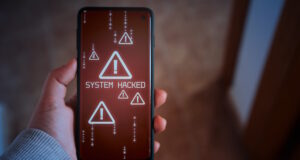 https://www.vecteezy.com/photo/26314635-woman-shows-smartphone-with-system-hacked-alert-on-screen-compromised-information-concept-internet-virus-cyber-security-and-cybercrime
