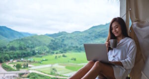 https://www.freepik.com/premium-photo/beautiful-asian-woman-working-typing-laptop-computer-while-sitting-balcony-with-mountains-green-nature-background_21484668.htm?query=relax%20outside%20reading%20investments#from_view=detail_alsolike