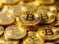 Bitcoins https://www.vecteezy.com/photo/39887815-ai-generated-golden-bitcoin-shiners-closeup-full-frame-background