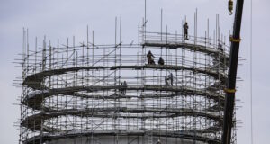 https://www.vecteezy.com/photo/7500527-construction-workers-tank-oil-installing-scaffolding