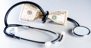 https://www.vecteezy.com/photo/30964388-high-cost-of-medical-health-with-stethoscope-stethoscope-wrapped-around-money-isolated-stethoscope-tied-with-dollar-bills