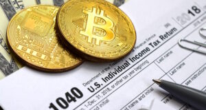 Crypto Tax https://www.vecteezy.com/photo/12583057-the-pen-bitcoins-and-dollar-bills-is-lies-on-the-tax-form-1040-u-s-individual-income-tax-return-the-time-to-pay-taxes