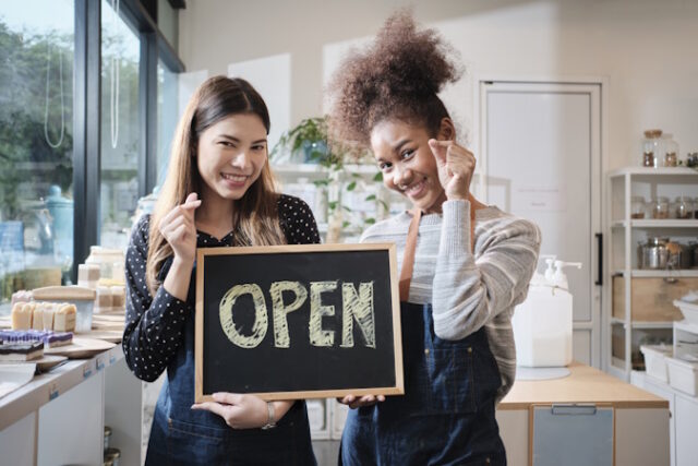 Women Business Owners, https://www.vecteezy.com/photo/17331161-two-young-female-shopkeepers-show-open-sign-board-with-cheerful-smiles-in-refill-store-shop-happy-work-with-organic-products-zero-waste-groceries-eco-friendly-merchandise-and-sustainable-business